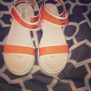 Neon orange plastic woman sandals